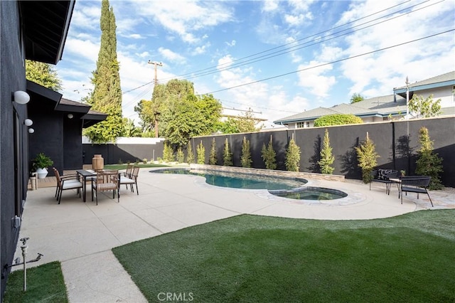 view of pool featuring a lawn, a fenced in pool, a fenced backyard, an in ground hot tub, and a patio area