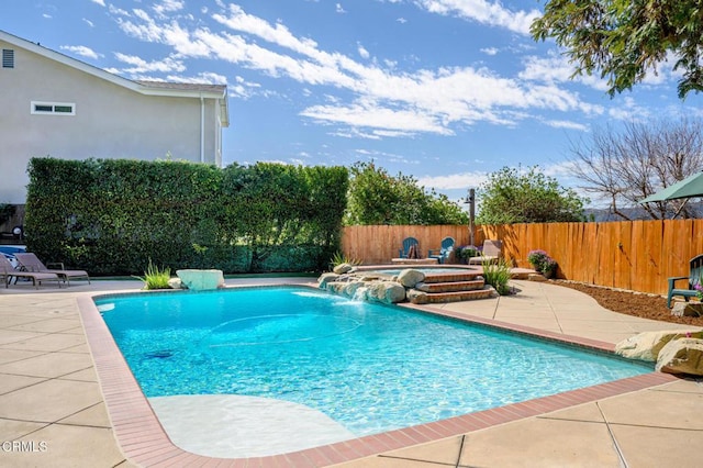 view of pool with a fenced in pool, a fenced backyard, a patio, and a hot tub