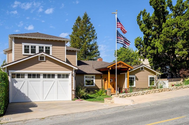 view of front facade with concrete driveway