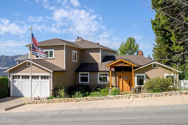 view of front of house with driveway and an attached garage