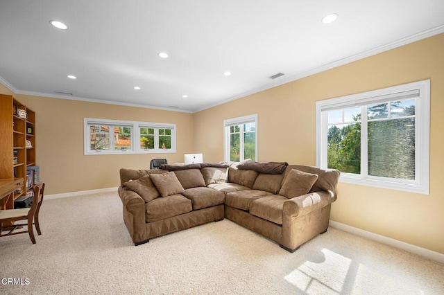 living area featuring baseboards, visible vents, crown molding, and light colored carpet