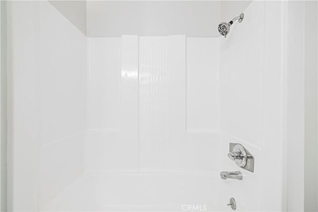 room details with shower / bathing tub combination