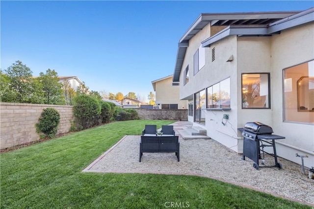 view of yard with a patio and a fenced backyard