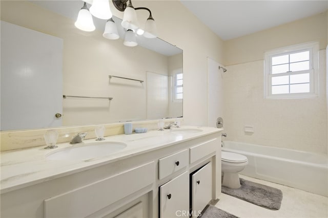 full bath with double vanity, shower / bath combination, a sink, and toilet