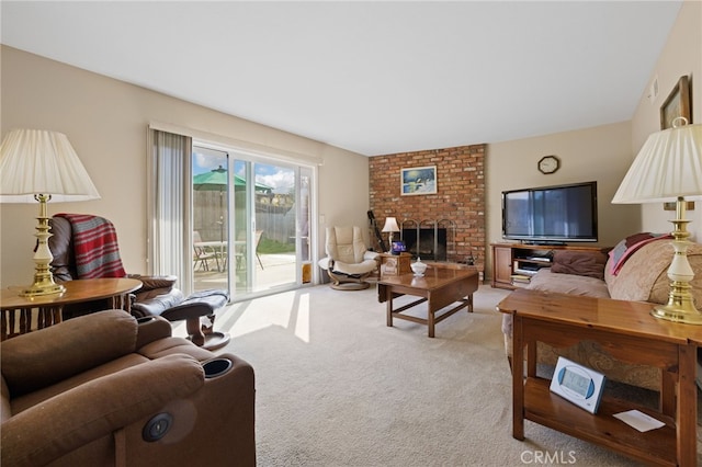 living room featuring a brick fireplace and light carpet