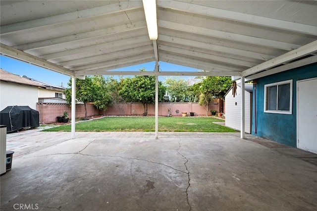 view of patio / terrace with grilling area and a fenced backyard