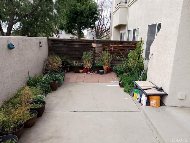 view of patio featuring fence private yard