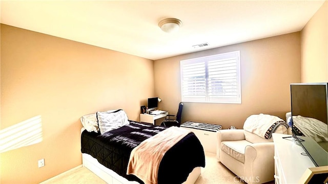 carpeted bedroom with visible vents