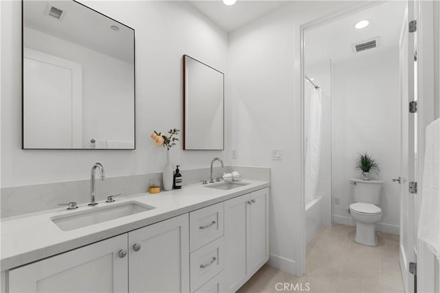 full bathroom featuring a sink, visible vents, and toilet