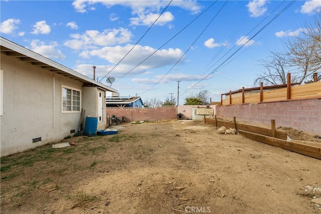 view of yard featuring a fenced backyard