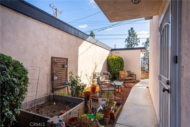 view of patio with a vegetable garden