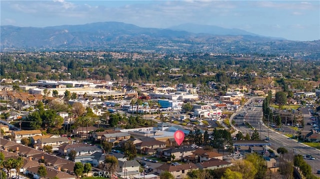 drone / aerial view featuring a mountain view