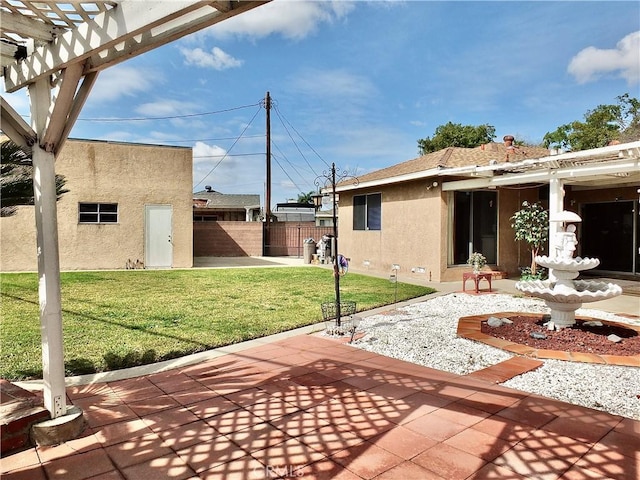 view of yard featuring a patio, fence, and a pergola