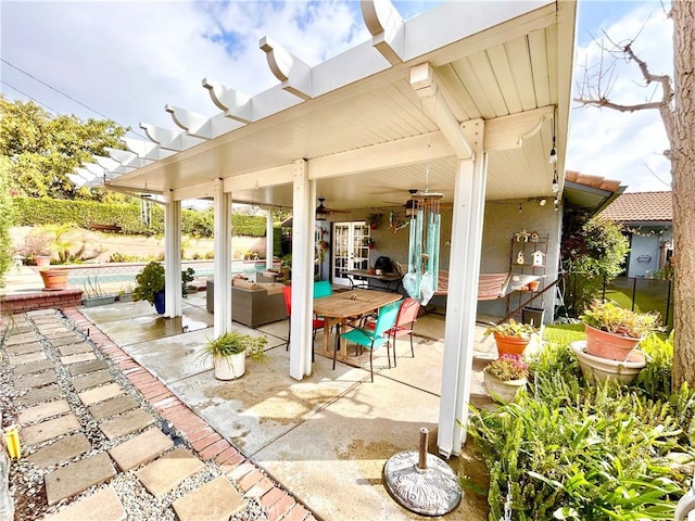 view of patio with french doors and ceiling fan