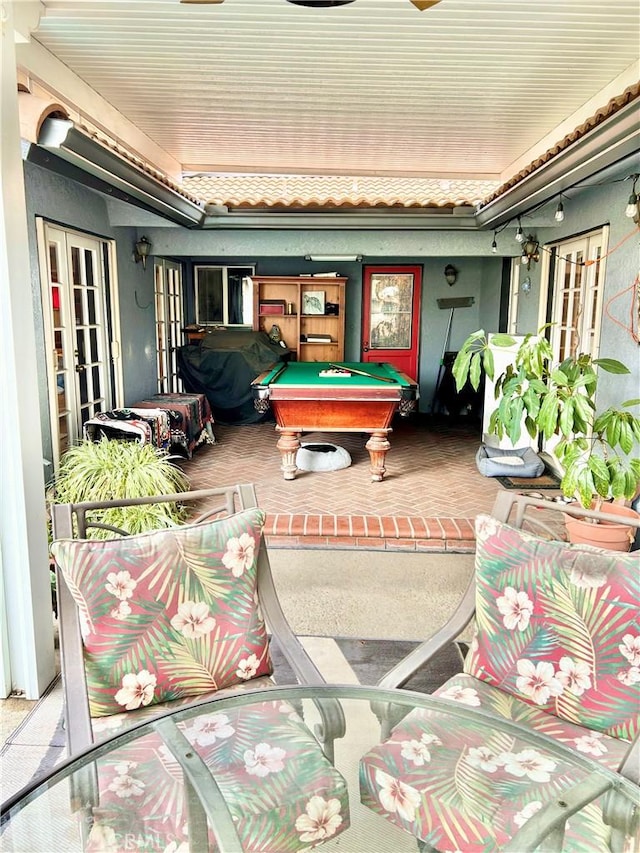 exterior space featuring pool table and french doors