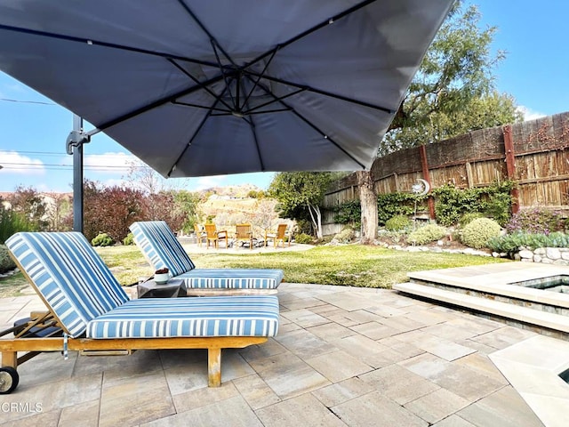 view of patio / terrace with fence