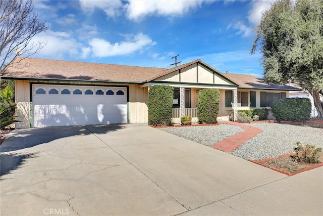 view of front of property with an attached garage and driveway