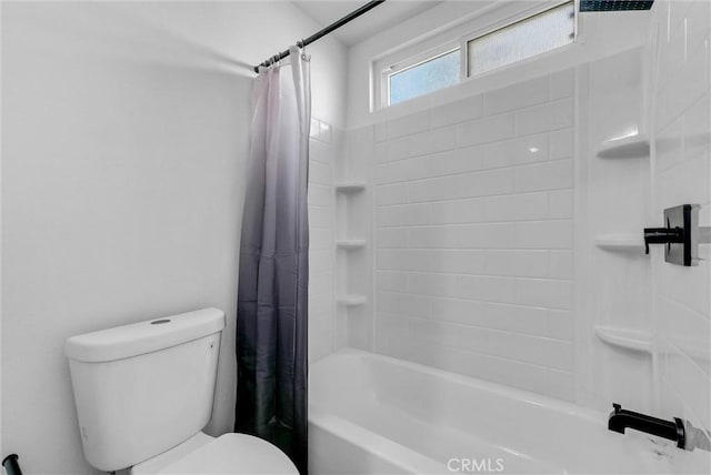 bathroom featuring toilet and shower / tub combo with curtain