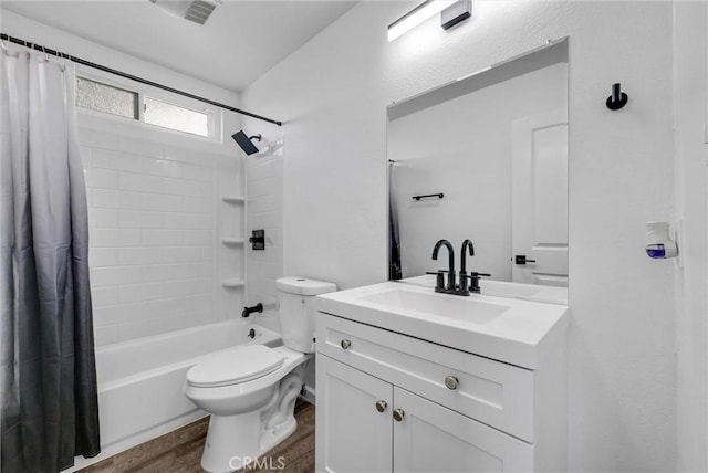 bathroom with shower / bath combo, vanity, toilet, and wood finished floors