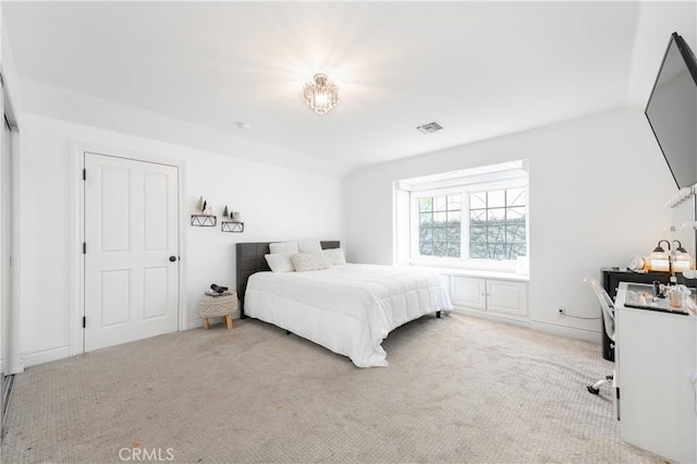 bedroom featuring visible vents and carpet flooring