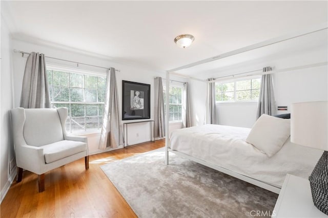 bedroom with light wood-type flooring