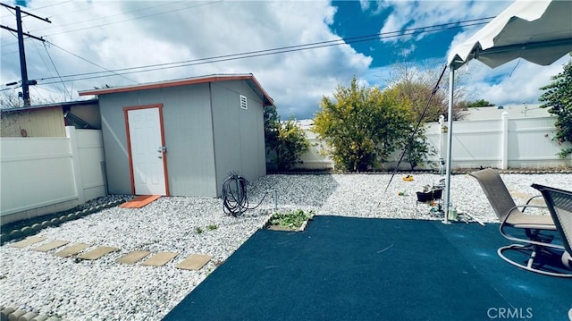 28821 Del Monte Dr, Menifee, CA 92586 - fenced backyard featuring a patio area and a shed