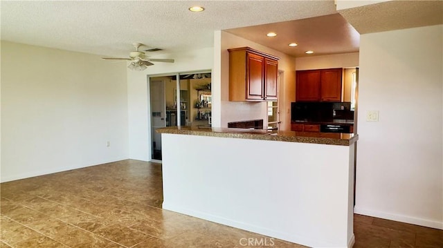 28821 Del Monte Dr, Menifee, CA 92586 - kitchen featuring ceiling fan, dark countertops, a textured ceiling, recessed lighting, and a peninsula