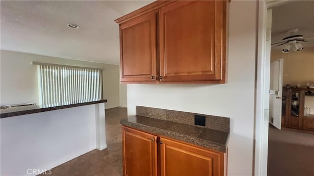 28821 Del Monte Dr, Menifee, CA 92586 - kitchen with tile counters, brown cabinets, and recessed lighting