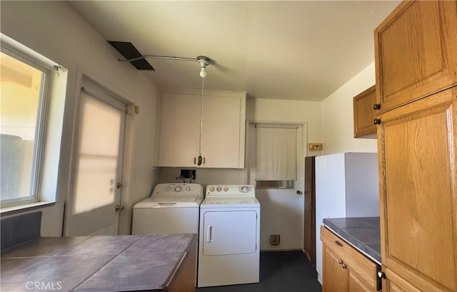 28821 Del Monte Dr, Menifee, CA 92586 - laundry area with cabinet space and washer and dryer
