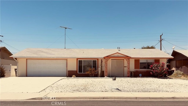 28821 Del Monte Dr, Menifee, CA 92586 - single story home featuring concrete driveway and an attached garage