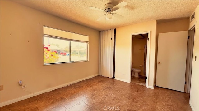 28821 Del Monte Dr, Menifee, CA 92586 - unfurnished bedroom with a textured ceiling and connected bathroom