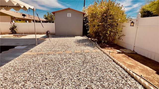 28821 Del Monte Dr, Menifee, CA 92586 - fenced backyard featuring a patio area and a shed