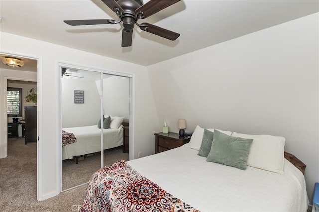 carpeted bedroom with a closet and a ceiling fan