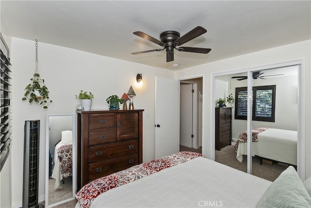 bedroom featuring a closet, carpet flooring, and ceiling fan