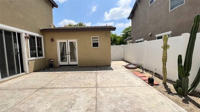 view of patio with a fenced backyard and french doors