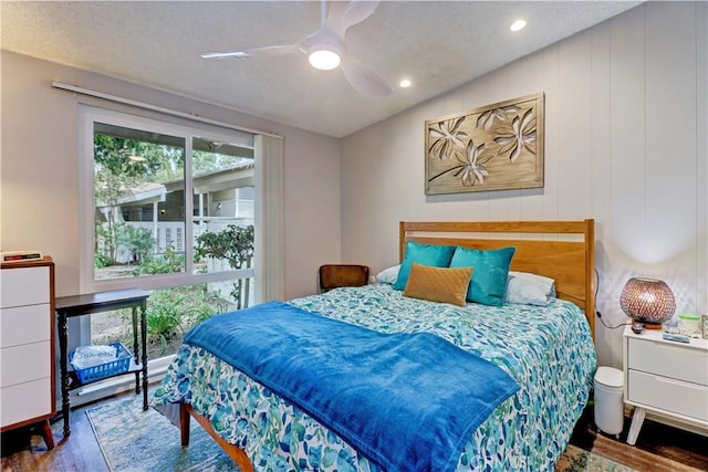 bedroom with a ceiling fan, recessed lighting, and wood finished floors