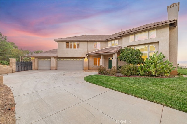 41445 Terrazzo Dr, Palmdale, CA 93551 - prairie-style home with concrete driveway, stucco siding, a chimney, and a garage