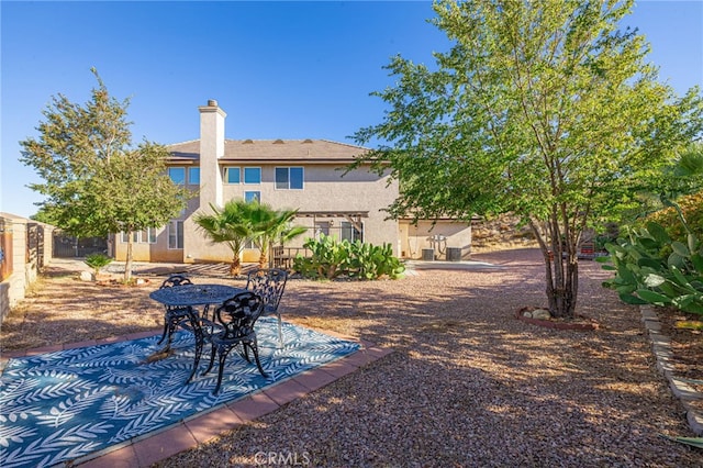 view of yard with a patio area and fence