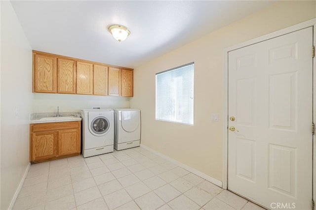 41445 Terrazzo Dr, Palmdale, CA 93551 - washroom featuring cabinet space, washer and clothes dryer, baseboards, and light tile patterned floors
