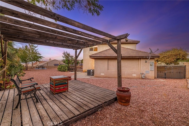 view of patio / terrace with a gate, fence, a deck, a pergola, and cooling unit