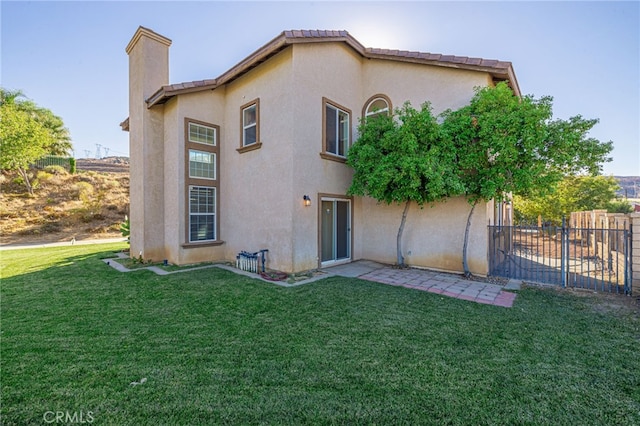 41445 Terrazzo Dr, Palmdale, CA 93551 - back of property with a chimney and stucco siding
