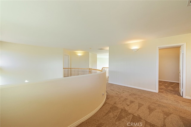 41445 Terrazzo Dr, Palmdale, CA 93551 - corridor featuring light carpet, an upstairs landing, and baseboards