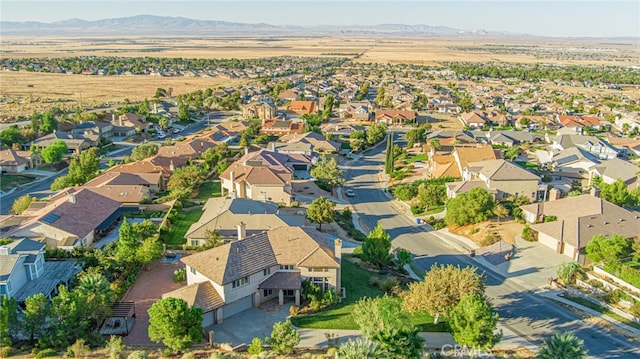 aerial view with a mountain view and a residential view