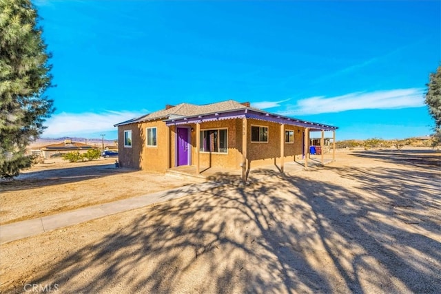 view of front of house with stucco siding