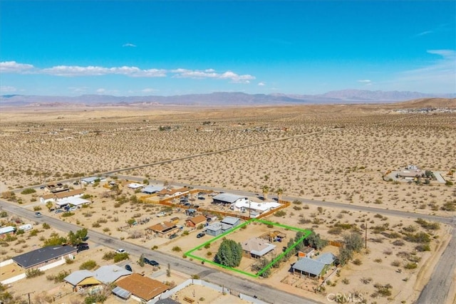 bird's eye view with a desert view, a rural view, and a mountain view