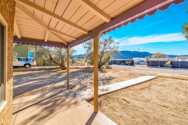 view of patio with a mountain view