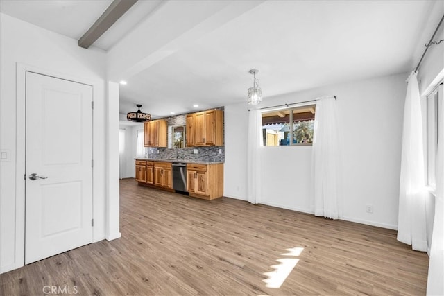 kitchen featuring dishwasher, backsplash, light wood-style flooring, and brown cabinets