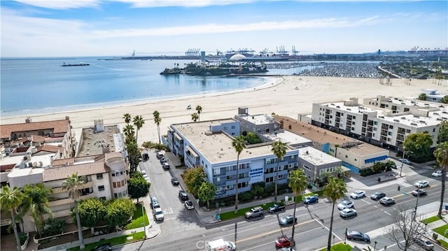 bird's eye view with a view of the beach and a water view