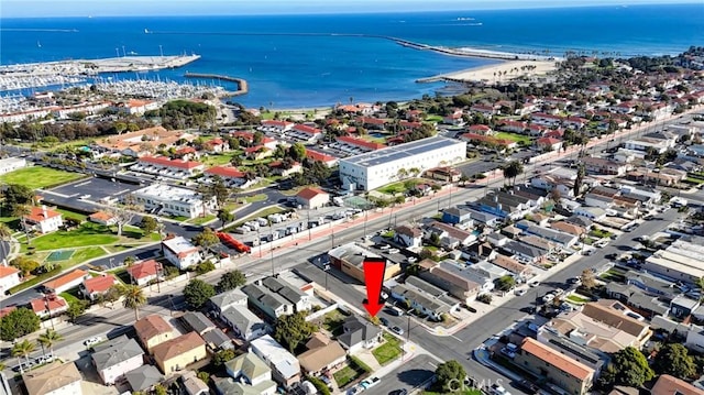 birds eye view of property featuring a water view