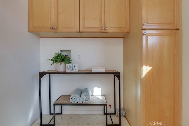 room details featuring baseboards and tile patterned floors